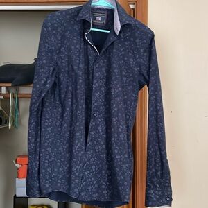 Navy blue floral button up 
Missing a button
